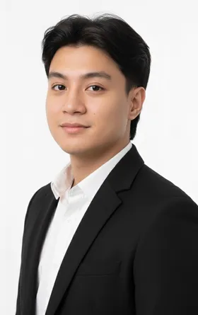 Christian T. Macion, professional portrait, three-quarter view. Photographed January 2026.